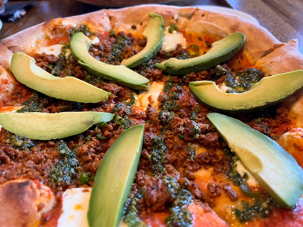 Wood-fired pizza fresh from the oven.